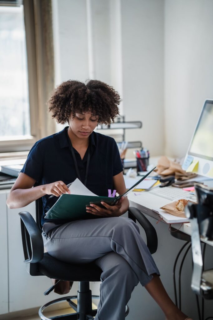 Black businesswoman reviewing documents