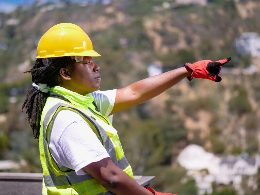 Black engineer carrying out a field inspection