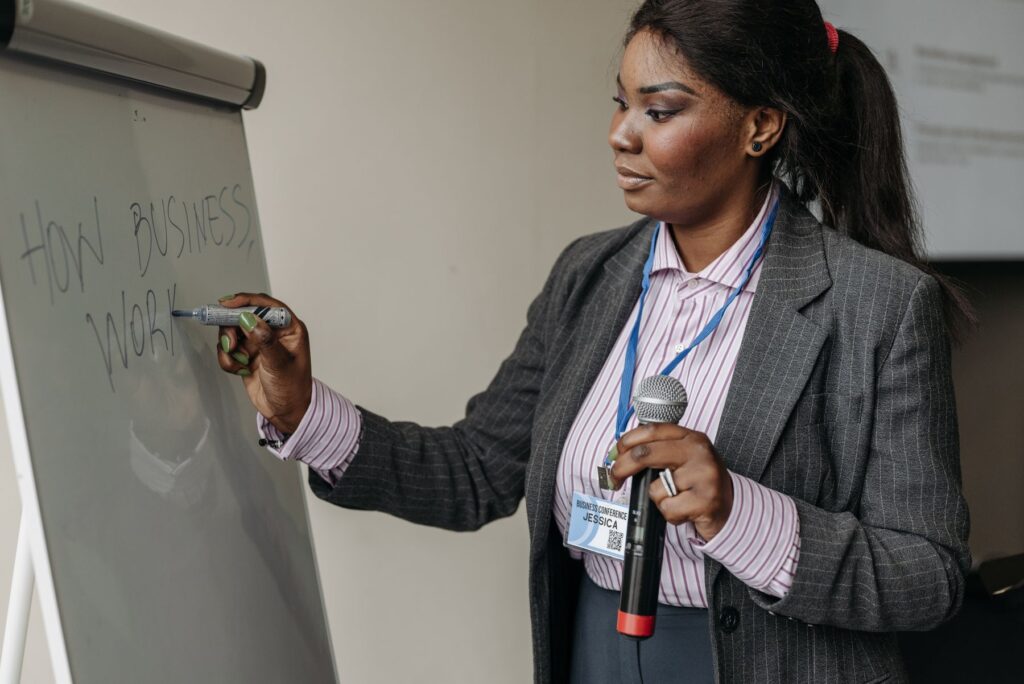 Black facilitator leading a professional workshop