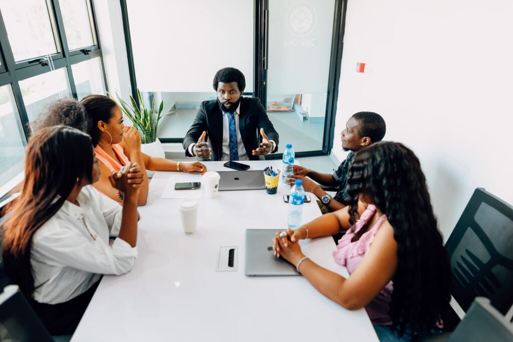 African professionals collaborating in a Lagos office